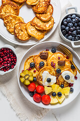 Image showing Homemade low calarie curd cheese pancakes with fruit salad