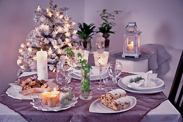 Image showing Table setting for celebration Christmas and New Year Holidays. Festive table at home. 