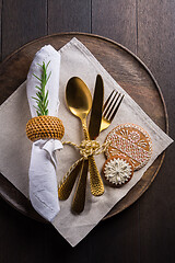 Image showing Christmas table place setting with vintage silverware and gingerbread