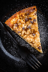 Image showing Piece of homemade apple pie with chocolate pieces for Thanksgiving