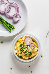 Image showing Egg spread with onion and chives on marble background