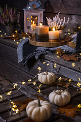 Image showing Autumn terrace or patio in night with pumpkins and heather plant 