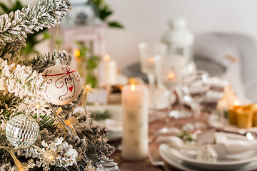 Image showing Table setting for celebration Christmas and New Year Holidays. Festive table at home. 