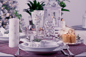 Image showing Table setting for celebration Christmas and New Year Holidays. Festive table at home. 