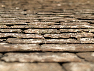 Image showing Old black tiles roof