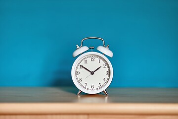 Image showing Alarm Clock on a Shelf