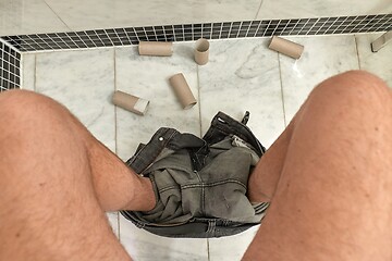 Image showing Finding empty roll in the restroom