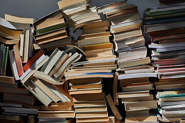 Image showing Wall of books piled up