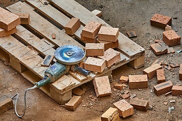 Image showing Brick House Construction, Cutting bricks