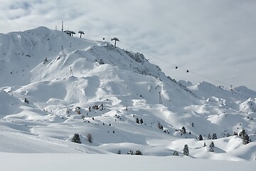 Image showing Mountain skiing slopes, snowy Alpine landscape