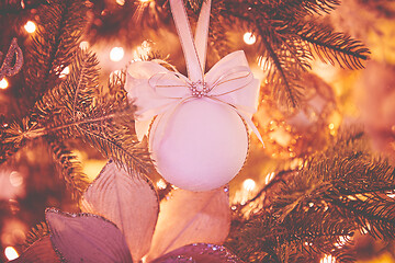 Image showing Closeup of Christmas tree decorations. Selective focus with retro faded colors