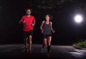 Image showing runners team on the night training