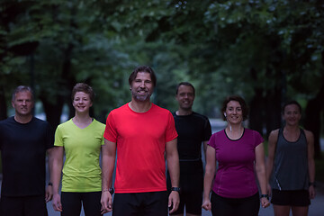 Image showing runners team on the night training