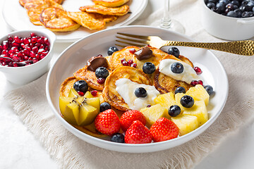 Image showing Homemade low calarie curd cheese pancakes with fruit salad