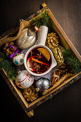 Image showing Mulled wine with orange, cinnamon and anise in mug for Christmas