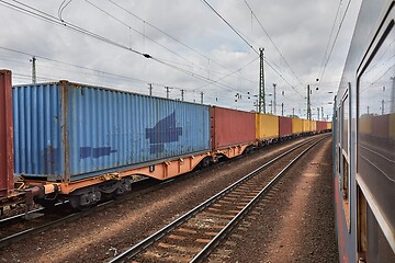 Image showing Freight train viewed from passanger window