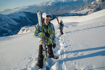 Image showing Skiing in fresh powder snow