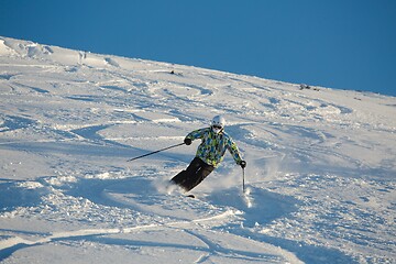 Image showing Skiing in fresh powder snow