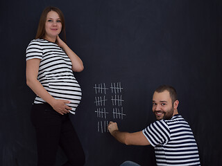 Image showing pregnant couple accounts week of pregnancy