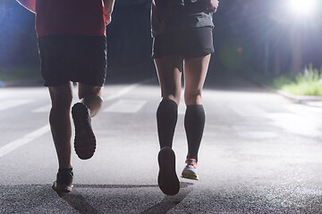 Image showing runners team on the night training