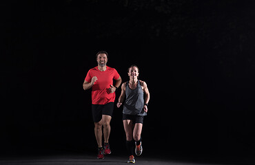 Image showing runners team on the night training