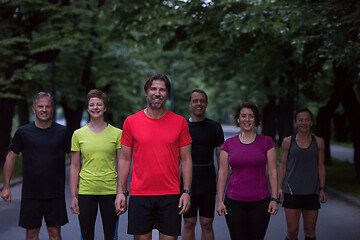 Image showing runners team on the night training