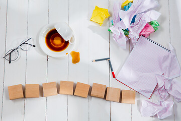 Image showing Message in wooden cubes on a desk background.