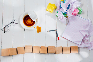 Image showing Message in wooden cubes on a desk background.