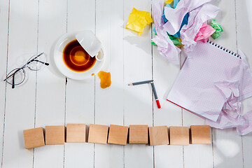 Image showing Message in wooden cubes on a desk background.