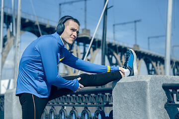 Image showing Man running on city background at morning