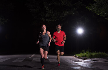 Image showing runners team on the night training