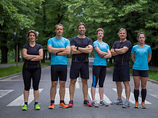 Image showing portrait of runners team on morning training