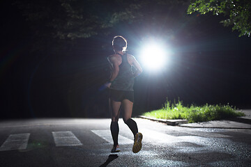 Image showing female runner training for marathon