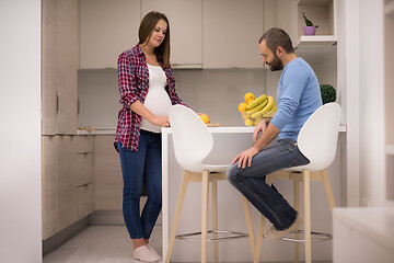 Image showing couple cooking food fruit lemon juice at kitchen