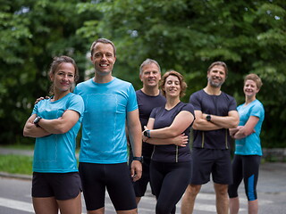 Image showing portrait of runners team on morning training