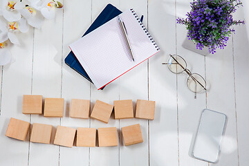 Image showing Message at wooden cubes on a desk background.