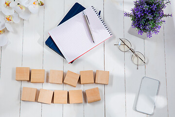 Image showing Message at wooden cubes on a desk background.