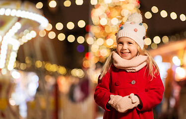 Image showing happy little girl at christmas market in winter