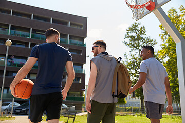 Image showing group of male friends going to play basketball