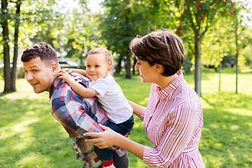 Image showing happy family having fun at summer park