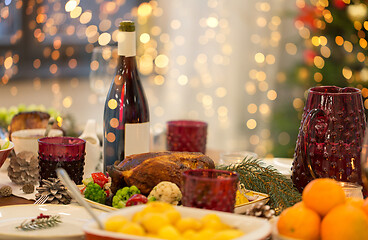 Image showing food and drinks on christmas table at home