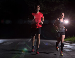 Image showing runners team on the night training