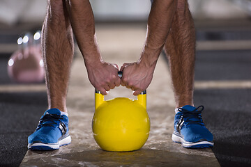 Image showing man exercise with fitness kettlebell