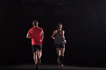 Image showing runners team on the night training