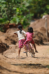 Image showing two cambodian kids on one bicycle