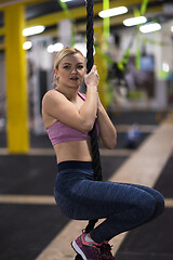 Image showing woman doing rope climbing