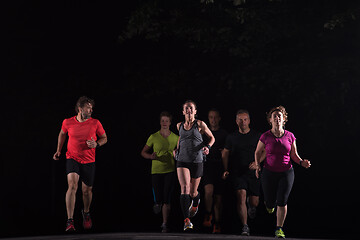 Image showing runners team on the night training