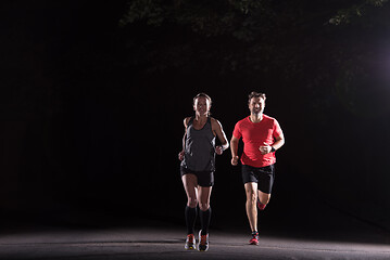 Image showing runners team on the night training