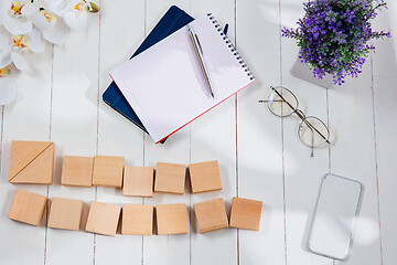 Image showing Message at wooden cubes on a desk background.