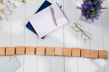 Image showing Message at wooden cubes on a desk background.